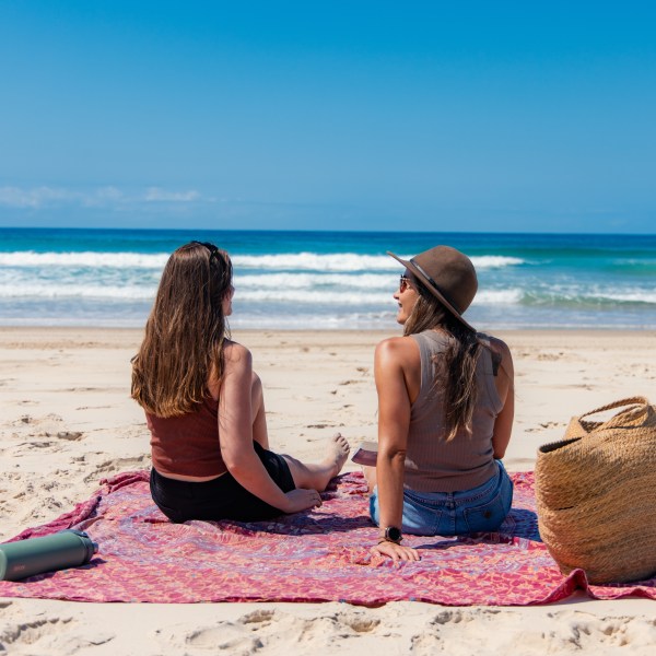a person sitting at a beach